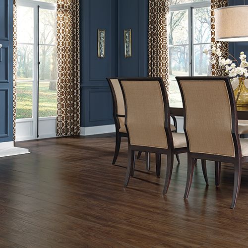 Dark brown vinyl flooring in modern dining room