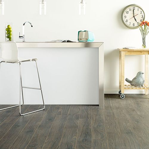 Modern kitchen with grey laminate floor